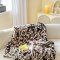 Thick striped chenille cover blanket in a choice of four colours, shown with dimensions of 130 by 170 centimetres.