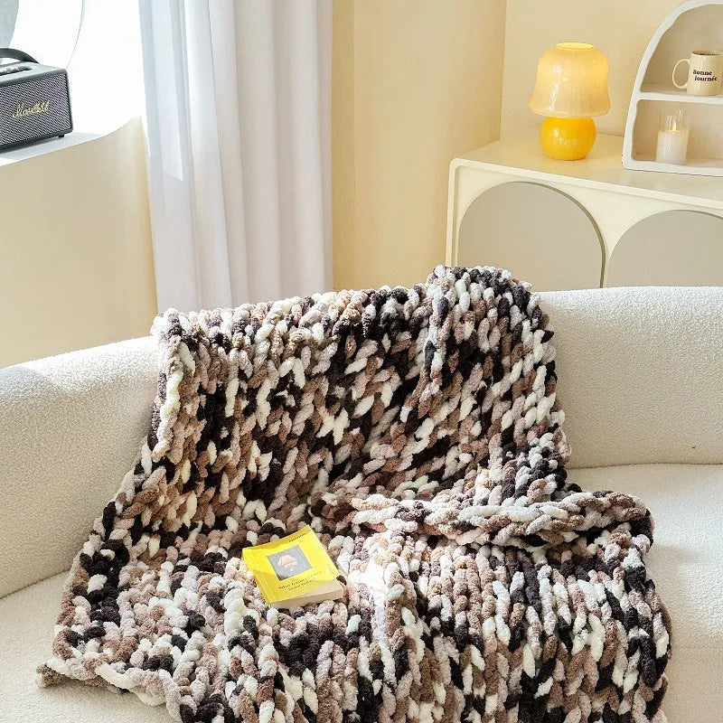 Thick striped chenille cover blanket in a choice of four colours, shown with dimensions of 130 by 170 centimetres.