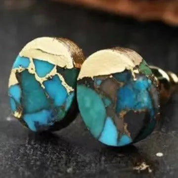 A pair of simple stud earrings with irregularly shaped natural stone beads in colour ER1031.