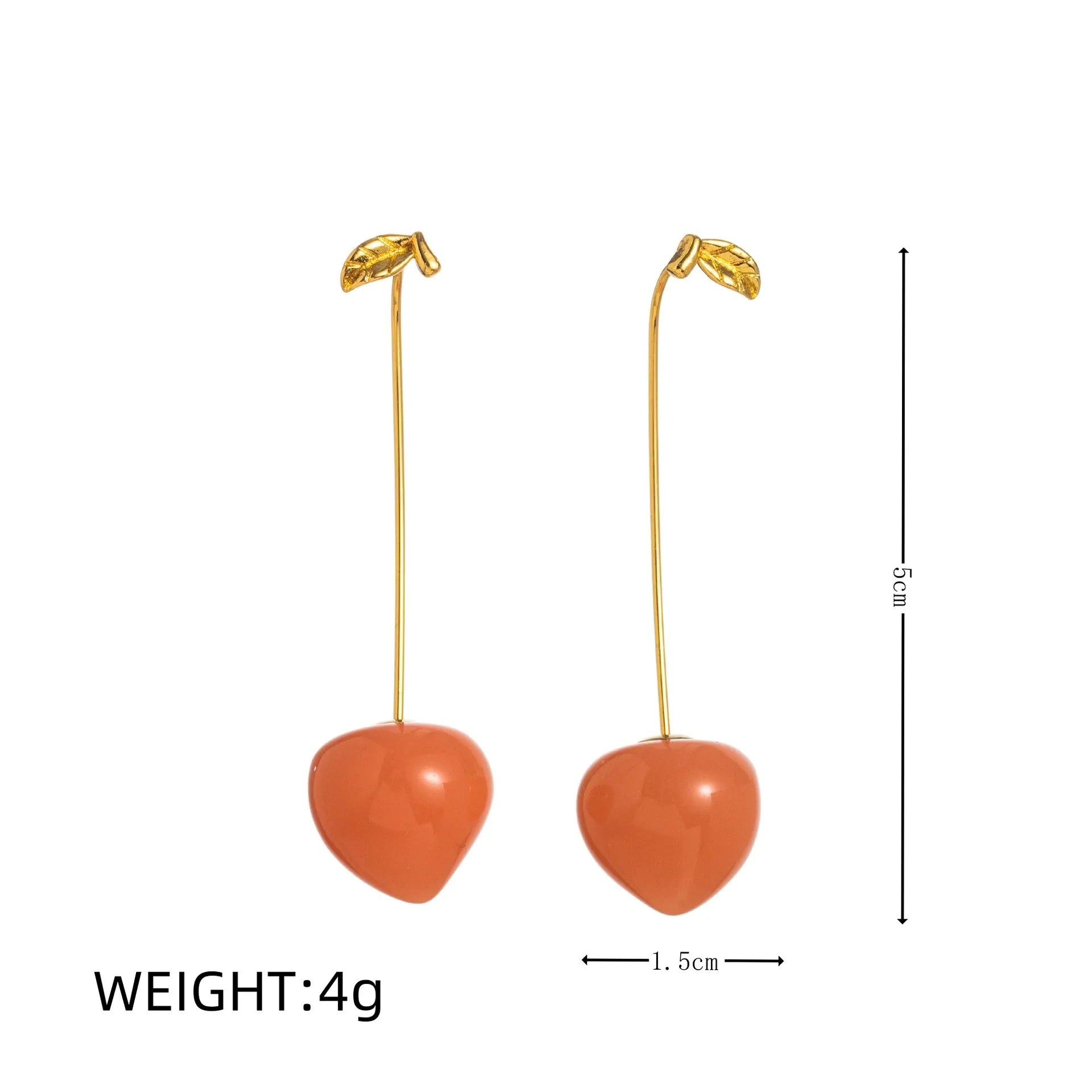 Gold plated fruit and vegetable design earrings showing carrot, orange and blueberry styles