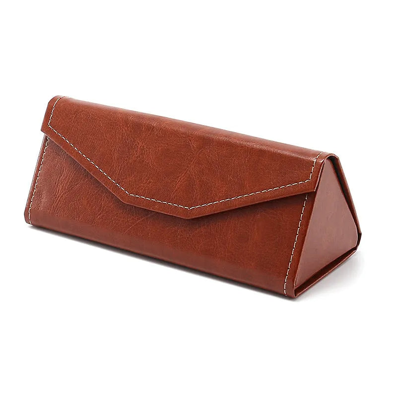 Handmade triangular folding glasses case in PU cowhide, shown in black colour with dimensions 160x66x16mm