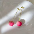Acrylic peach-shaped earrings with copper findings in two size variations