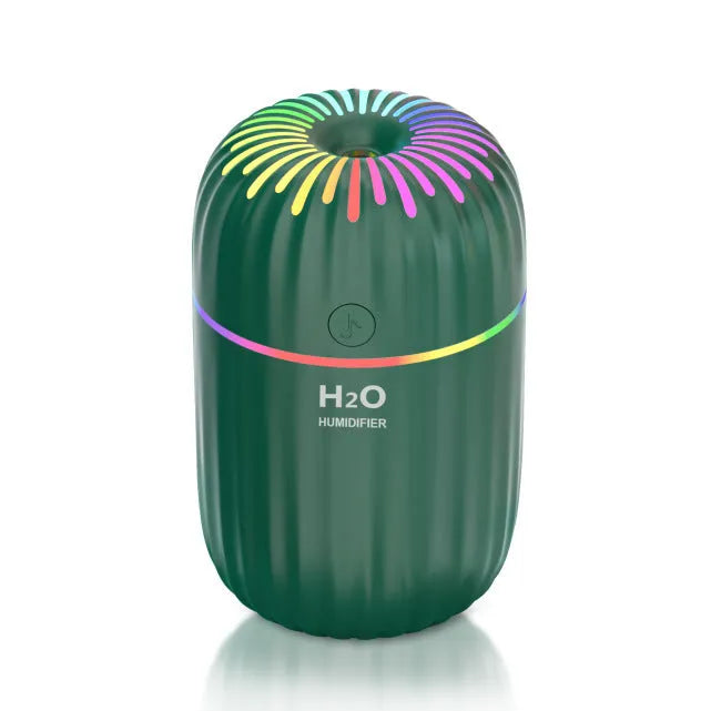 Mini animal-shaped USB humidifier with sterilisation function in green, pink, or white colours