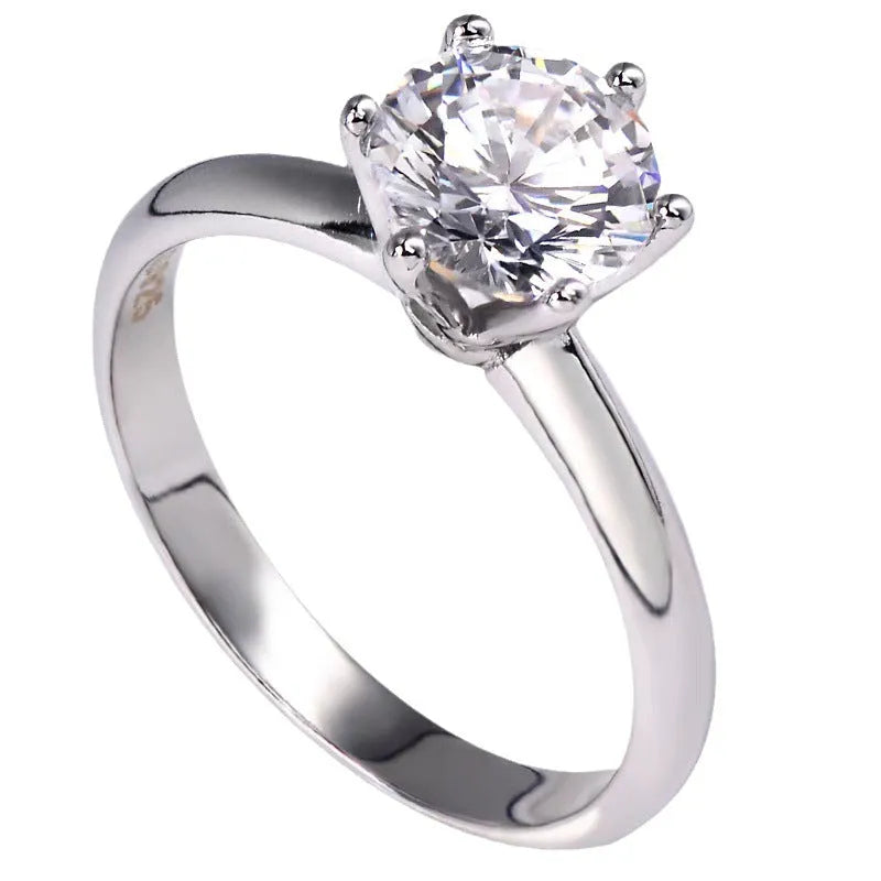White gold plated women's ring with six-claw zircon setting and geometric design