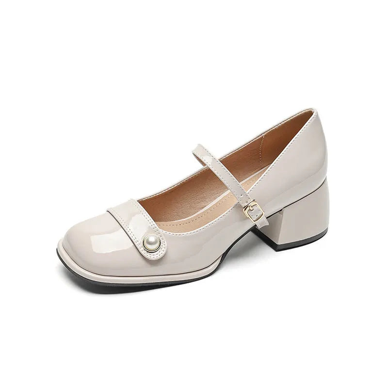 Patent leather chunky heel ankle boots with square toe and buckle fastening in apricot colour