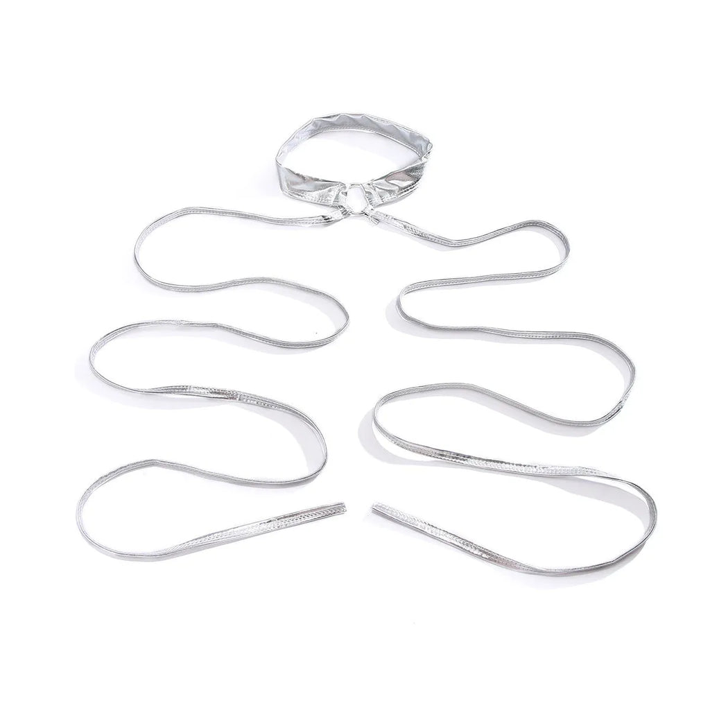 Silver geometric thigh chain with lace-up fastening showing cross detailing