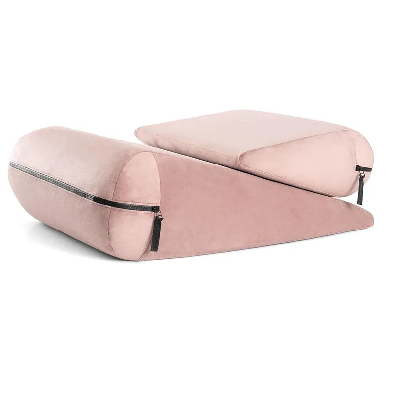 Triangular wedge cushion for furniture corner protection in grey colour with embroidery detailing.