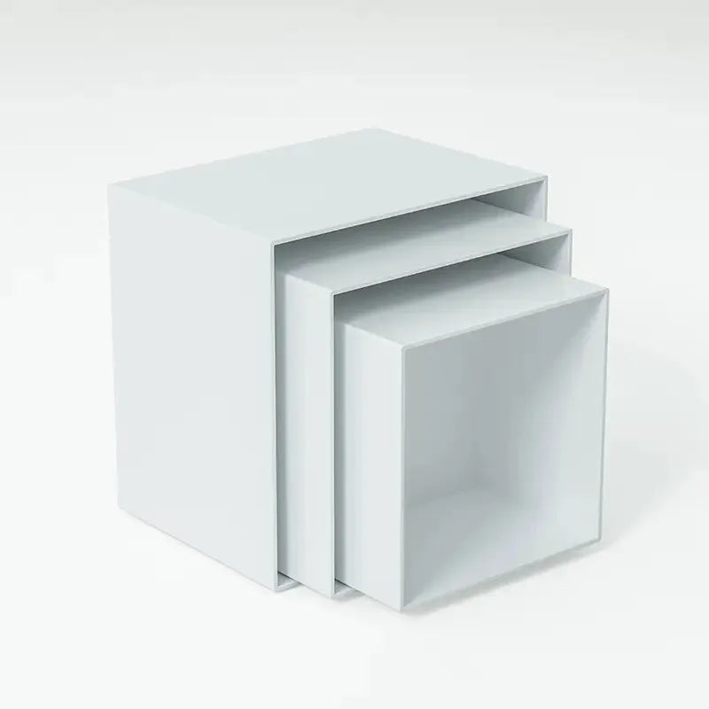 White plastic dessert display stand with six stacking cubes for tiered cake and dessert presentation
