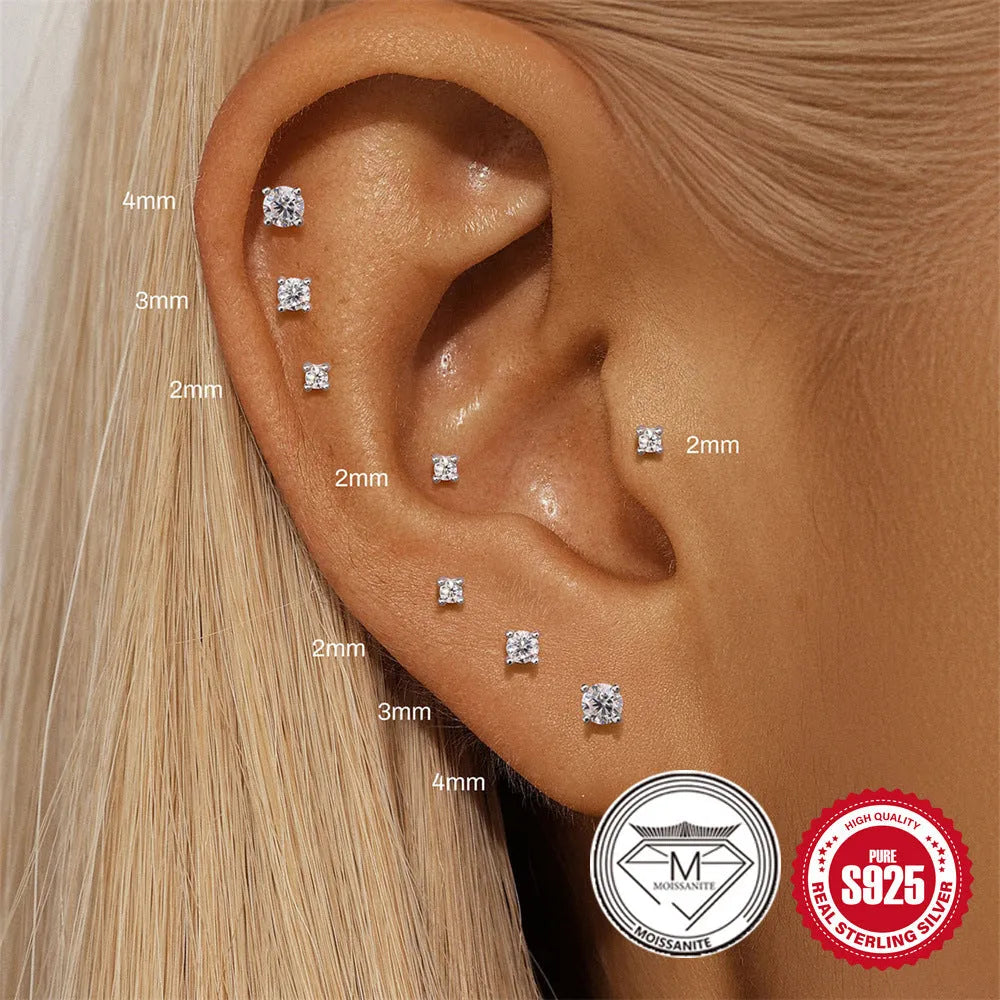Sterling silver S925 stud earrings with platinum finish showing geometric petal designs in round, triangle, and multi-petal shapes