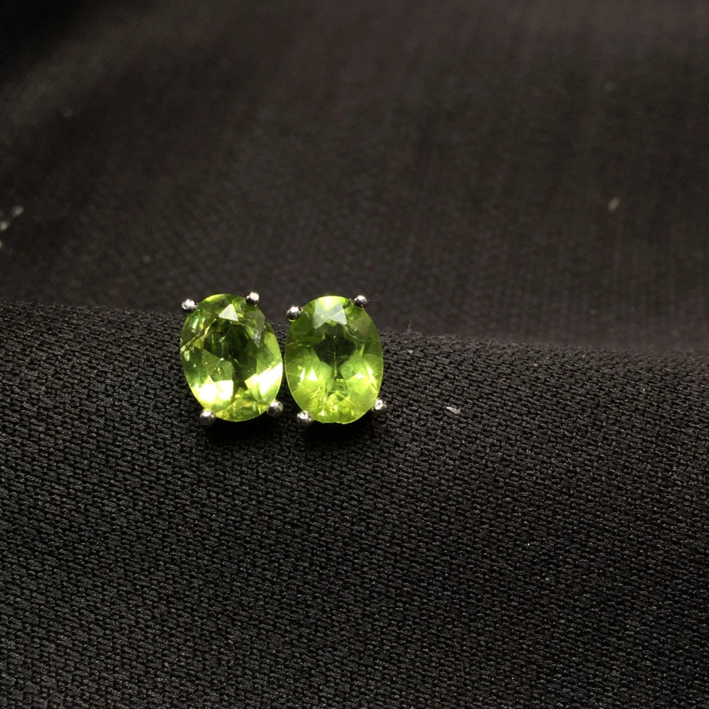 Natural olivine stud earrings in S925 silver with 6×8mm grass green faceted stones