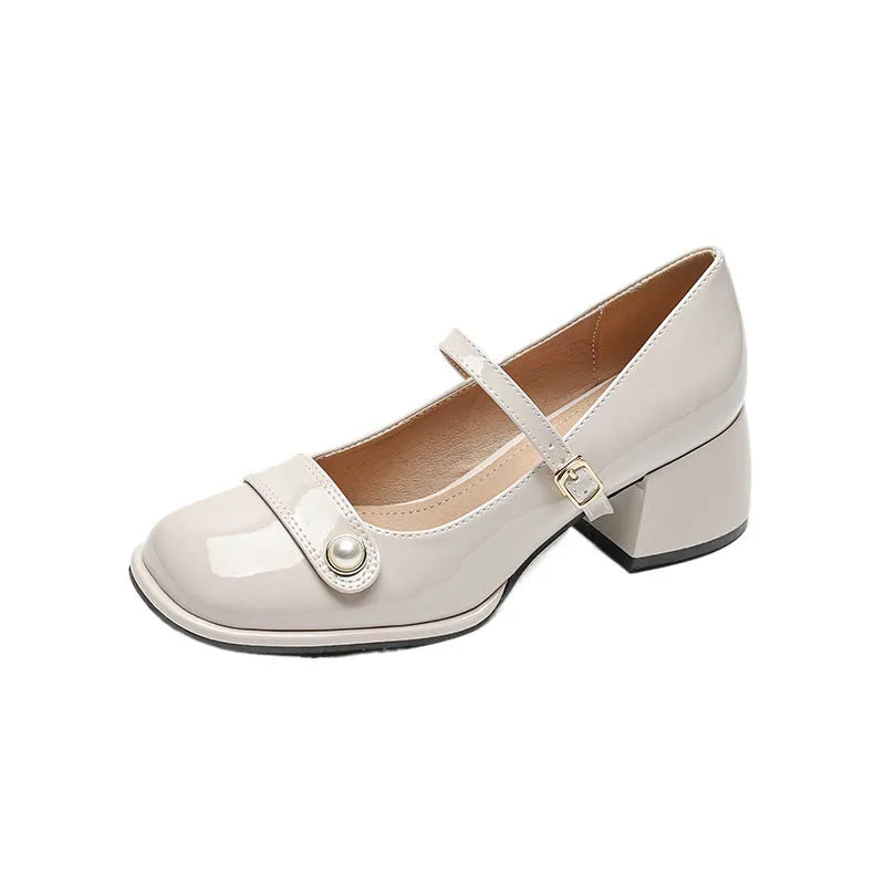 Patent leather chunky heel ankle boots with square toe and buckle fastening in apricot colour