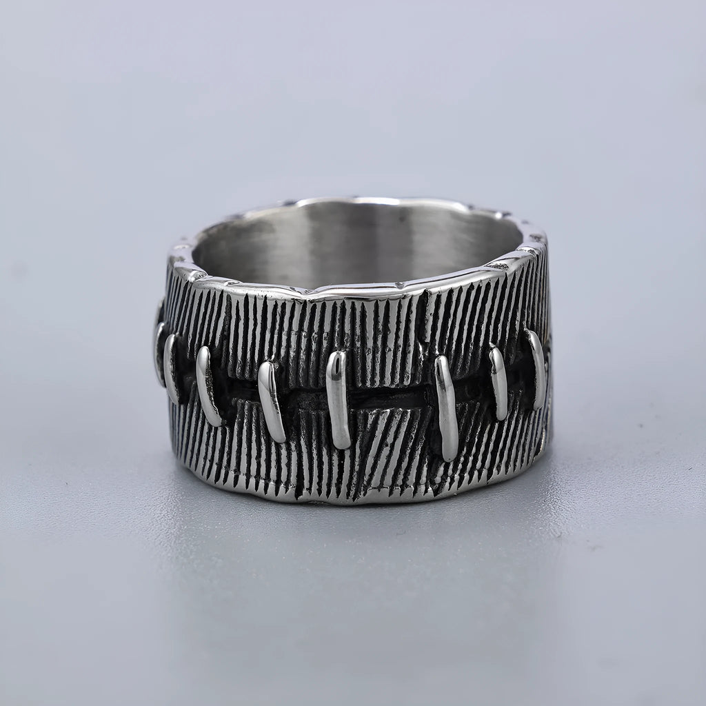 Titanium steel geometric double ring with U-shape, stitched pattern, and retro dark colour