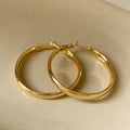 Gold and silver metal circle hoop earrings with 40mm diameter electroplated copper construction