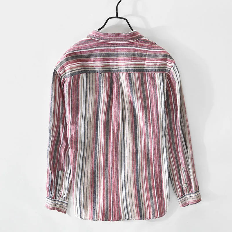 Man wearing a loose-fit red and grey striped linen long-sleeve casual shirt.