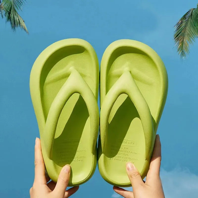 Solid colour thick-soled EVA flip-flops with a bow detail on the strap.