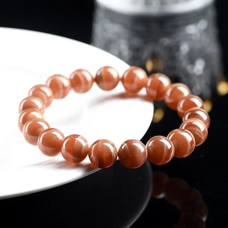 Peruvian Old Mine Rhodochrosite bracelet with geometric design and round beads
