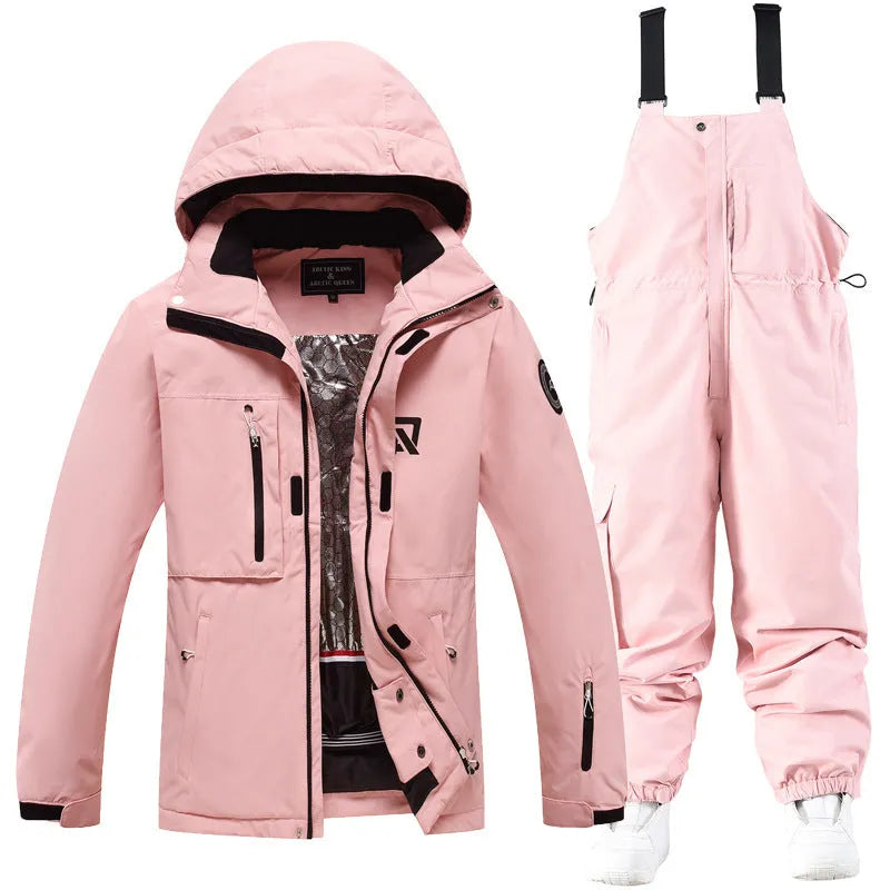 Blue and black unisex winter ski suit jacket and pants for snow sports.
