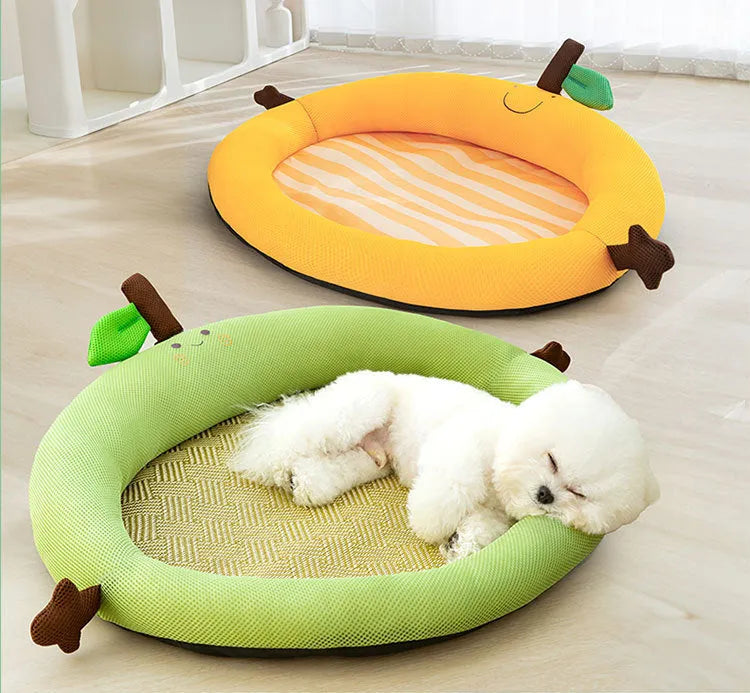 Green pet cooling mat with raised fruit backrest for dogs or cats on a wooden floor