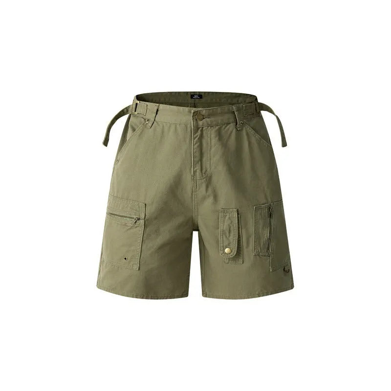 Retro loose-fit workwear shorts in washed cotton fabric with a zipper fly, shown in camouflage colour.