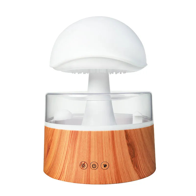 White cloud-shaped humidifier emitting mist with multi-coloured lighting and remote control