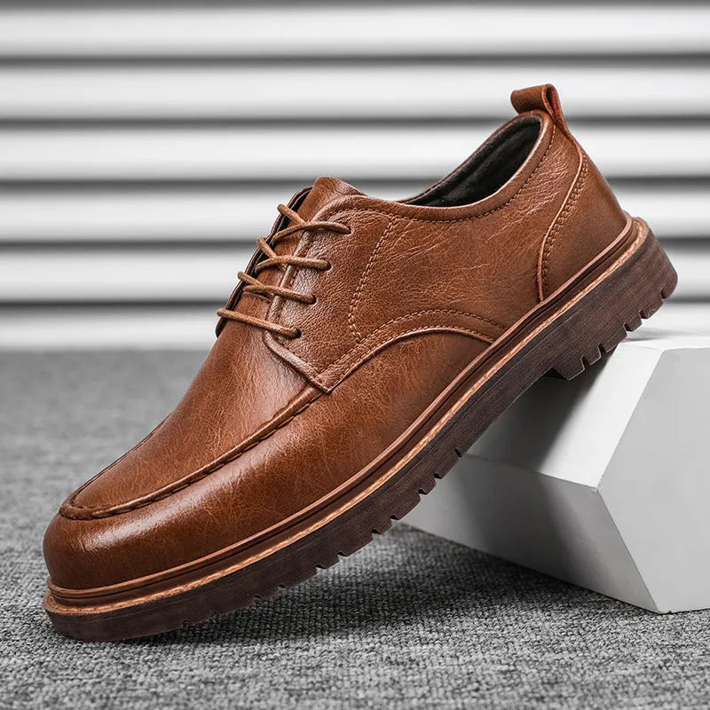 Men's black casual leather shoes with round toe, low-top design and decorative sewing lines