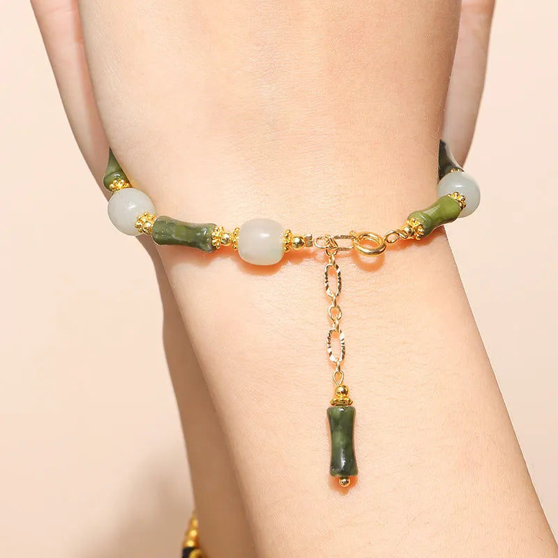 Handmade crystal agate bracelet with natural gemstone beads and a decorative charm