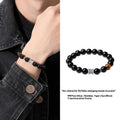 Pure silver obsidian six-word mantra bracelet with hand-woven construction and prayer wheel beads