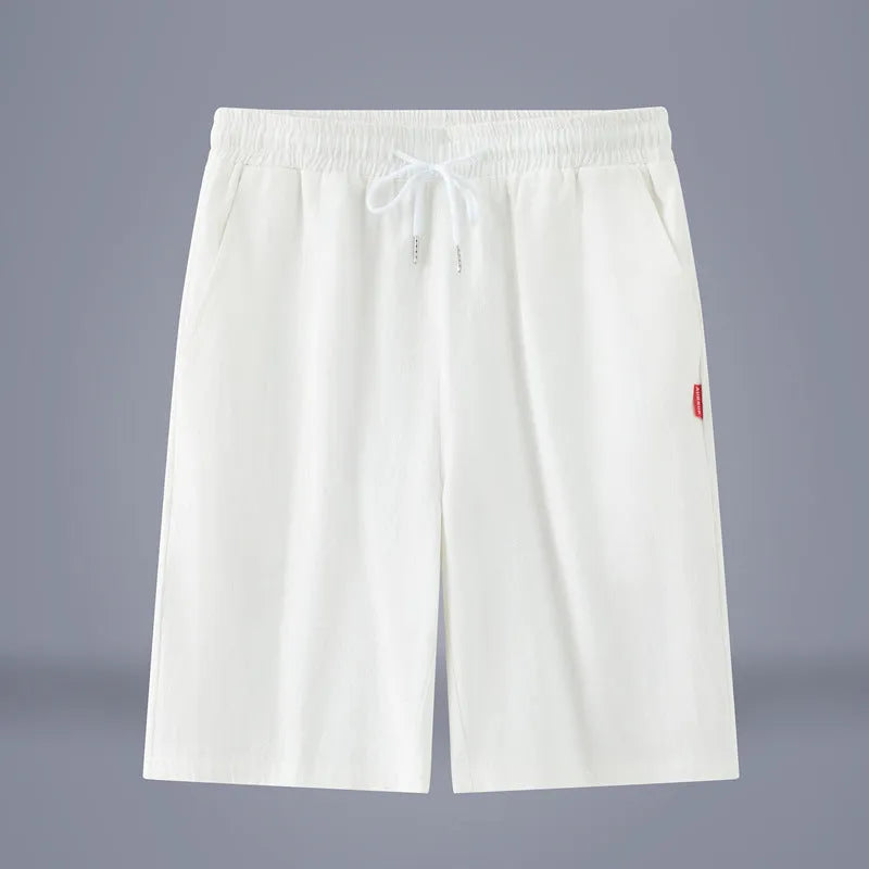 Cotton linen cropped summer trousers in a solid colour with a drawstring waist, shown in a casual Chinese-style fit.