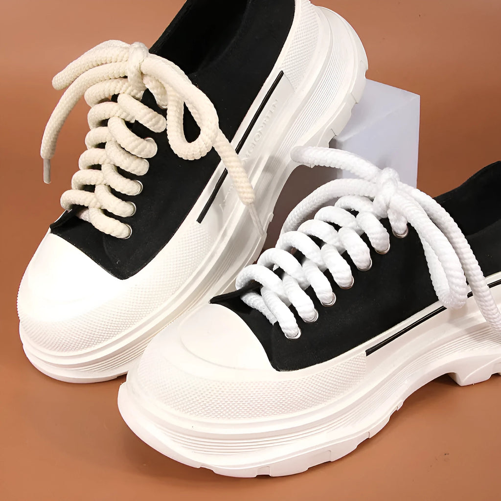 Round 10mm diameter woven shoelaces in white, beige and black colours showing thickness variations
