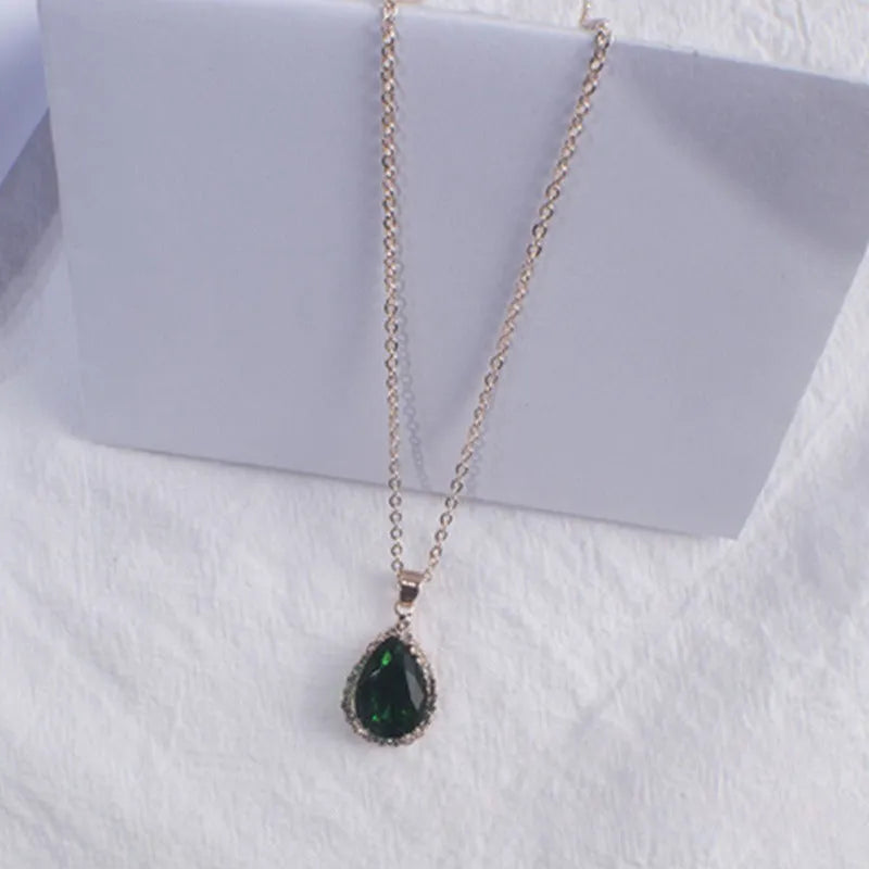 Women's water drop necklace with rose gold rhinestone and pink alloy gemstone pendant.