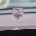 Set of six small yellow PVC duck figurines and one plastic sign for car dashboard decoration.