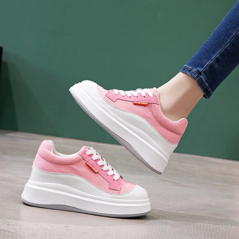 Beige and pink women's cowhide leather platform board shoes with a thick sole.