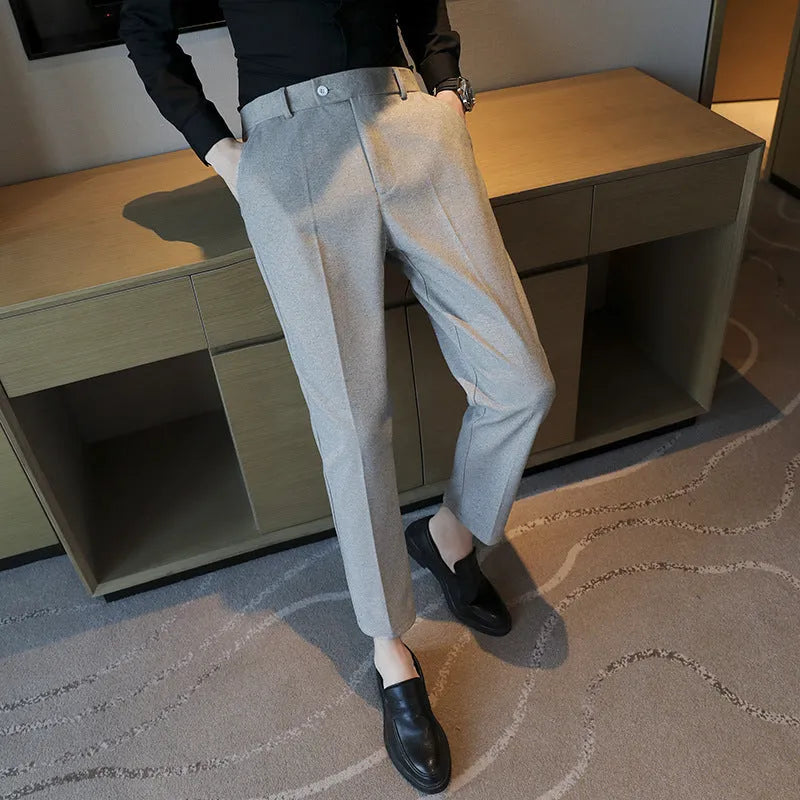Straight fit brown corduroy trousers with elastic waistband on hanger