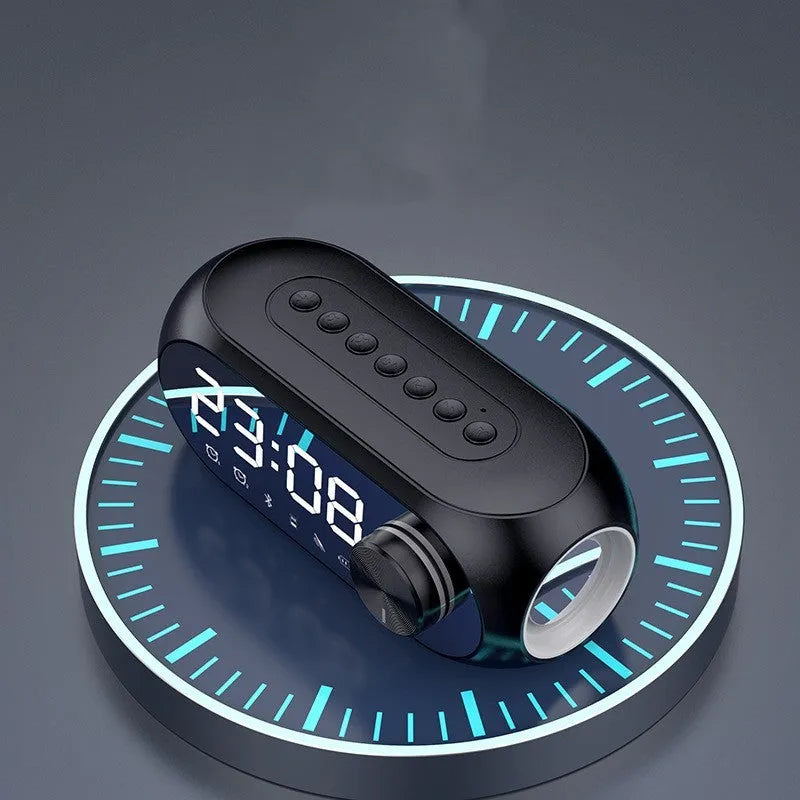 S8 Black portable mini clock and Bluetooth speaker with extra bass on a desk, connected via USB cable.
