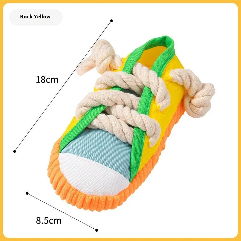 Squeaky plastic dog slipper chew toy in rock yellow, black and sea fog blue colours