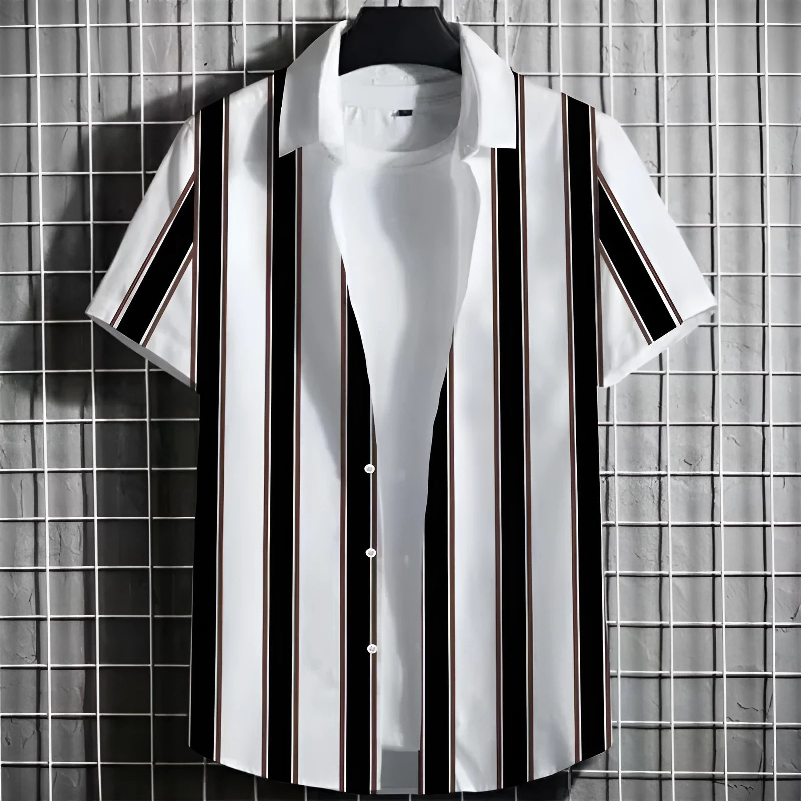 Man wearing a linen t-shirt with a striped and 3D printed graphic design.