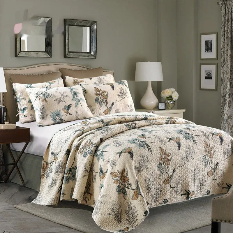 Quilted cotton bed cover set with printed pattern including bedspread and two pillowcases