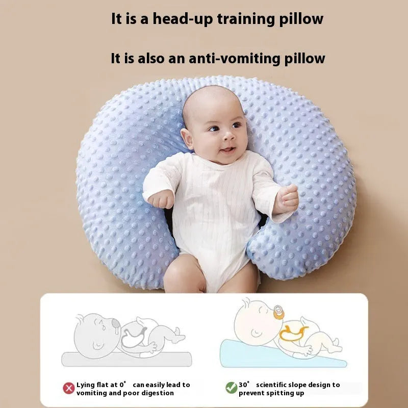 Multifunctional nursing pillow with milk spill prevention features in grey, light blue, pink and yellow colours