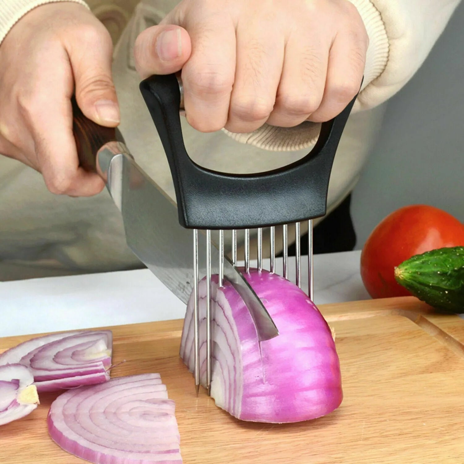 Stainless steel kitchen onion holder slicer with ABS handle measuring 14cm by 9.5cm