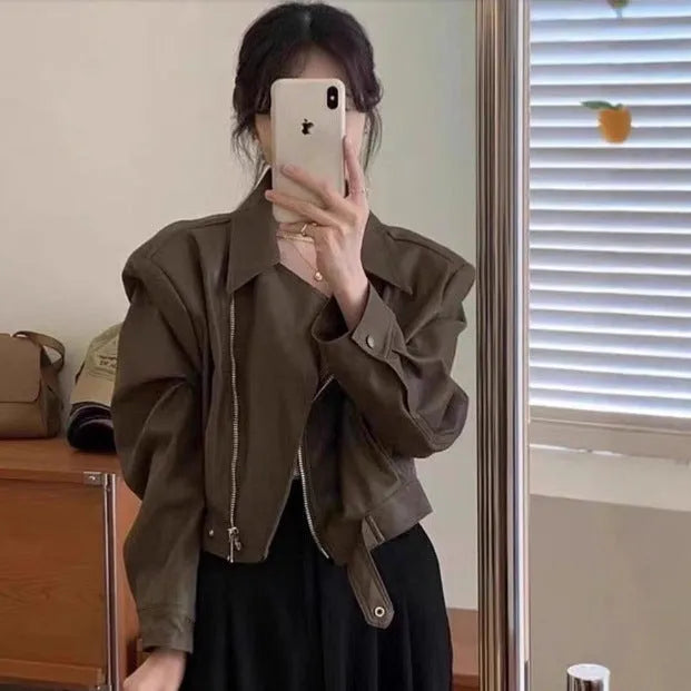 Brown women's retro slim-fit imitation leather coat with a pocket and regular sleeves.