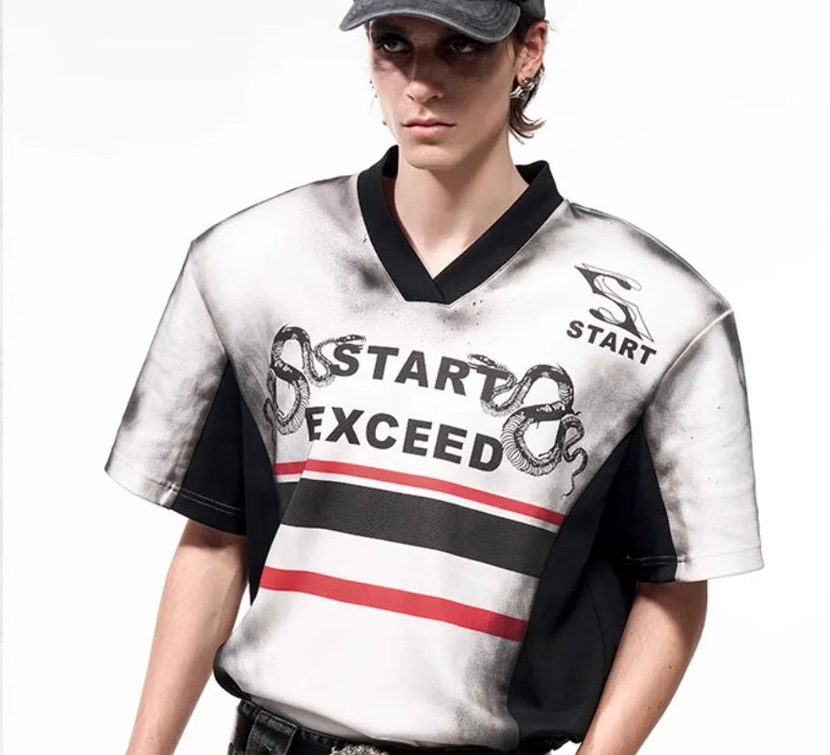 V-neck short sleeve polyester top with padded shoulders and letter snake pattern print in refined Korean style