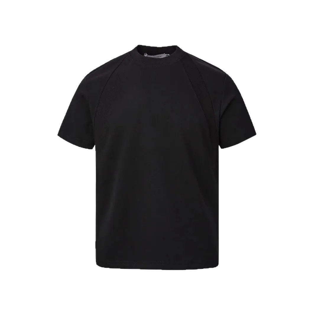 Black loose fit short sleeve top with textured air layer stitching design.