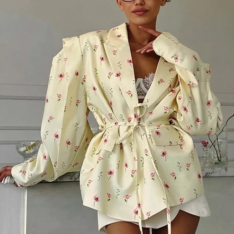 Collar lace-up waist-tight suit jacket in polyester fabric with long sleeves, showing cinched silhouette