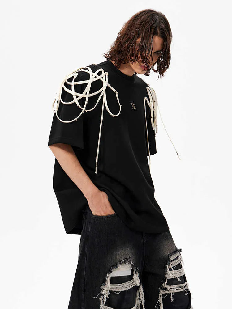 Black loose fit short-sleeved T-shirt with rivet ribbon padded shoulder detail