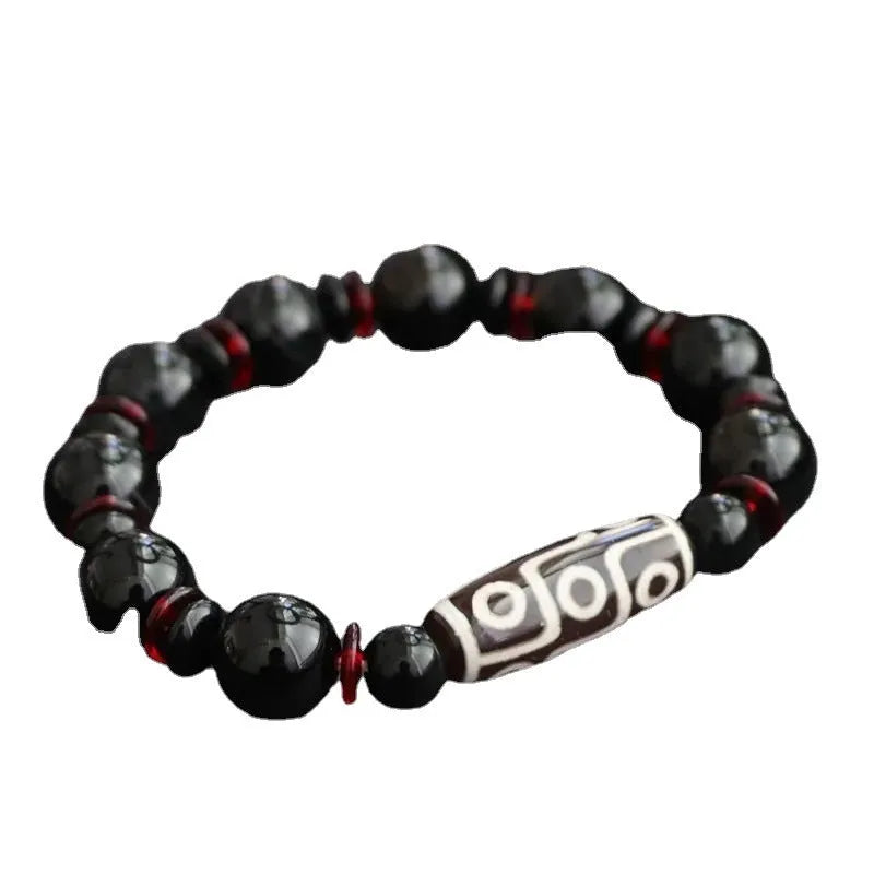 Hand-woven black agate Dzi bead bracelet with geometric design and national style elements