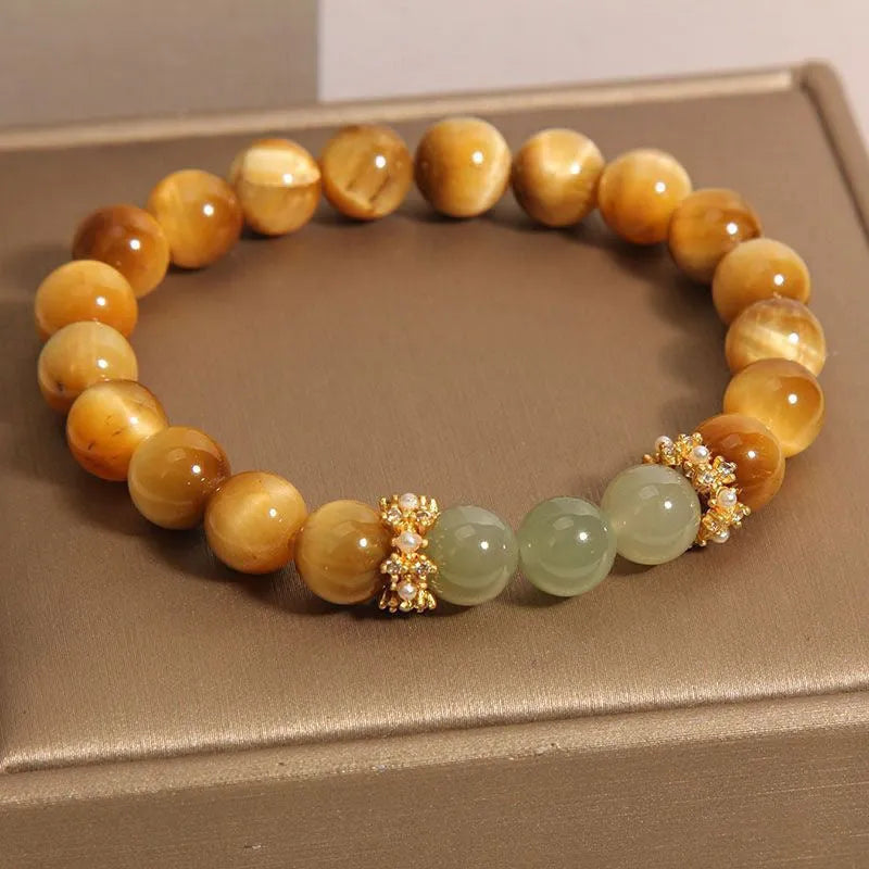 Natural yellow Tiger's Eye stone bracelet with Hetian jade accents in simple design