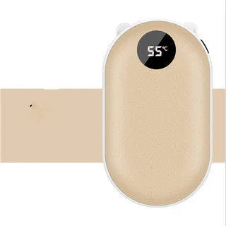 Compact rose gold rechargeable hand warmer and power bank with USB port on a table.