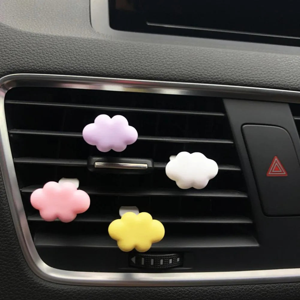 Resin car fragrance clip in pastel colours with cartoon cloud design for vent mounting