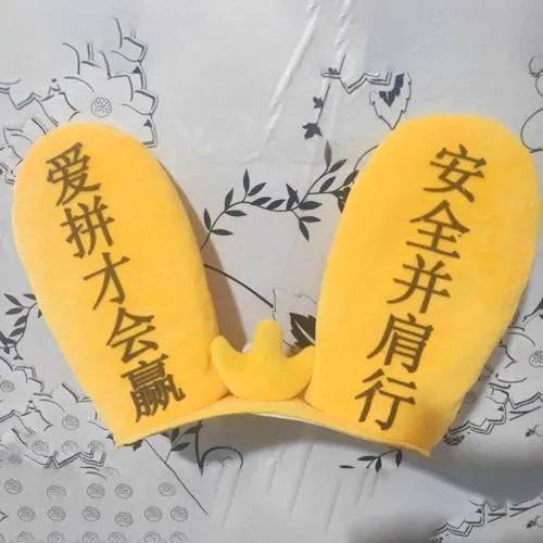 Rabbit Glow Ears helmet decoration with locomotive and ski designs on a Velcro base
