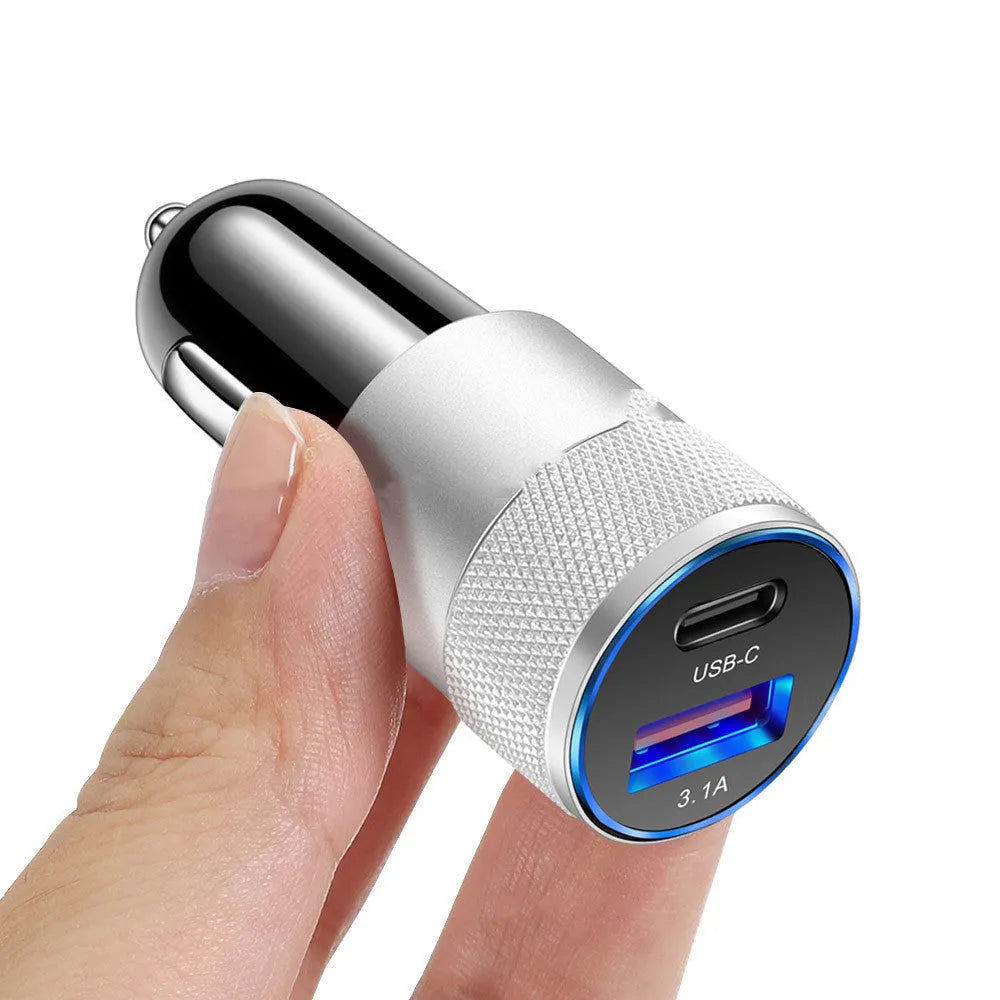 Aluminium alloy car phone charger mounted on a vehicle dashboard.